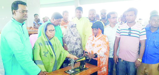 MONGLA (Bagerhat): Habibun Nahar, Deputy Minister for Forest, Environment and Climate Change distributing sewing machines among the distressed people in Mongla recently.
