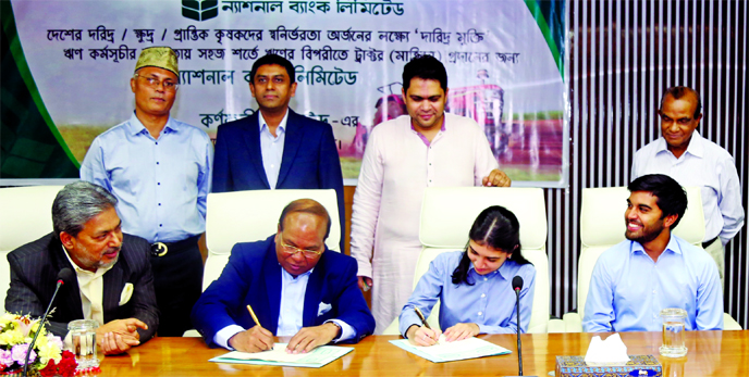MA Wadud, Additional Managing Director of National Bank Ltd (NBL) and Raimah Chowdhury, Director of Karnafuli Group, signing an agreement to provide tractors to the farmers at simple interest of Bank loan. NBL Managing Director Chowdhury Mostak Ahmed, Add