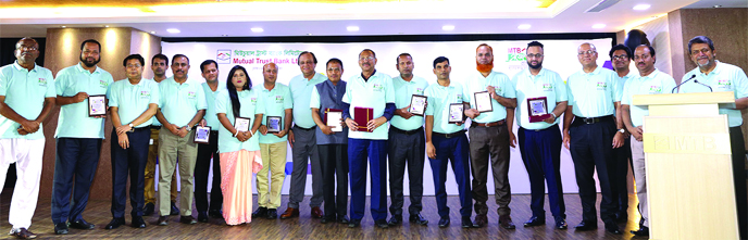 Anis A Khan, Managing Director of Mutual Trust Bank Ltd, inaugurating an Agent Banking Conference at Samson H Chowdhury Auditorium at MTB Tower in the city recently. AHM Rafiqul Islam, Joint Director of Financial Inclusion Department of Bangladesh Bank, D