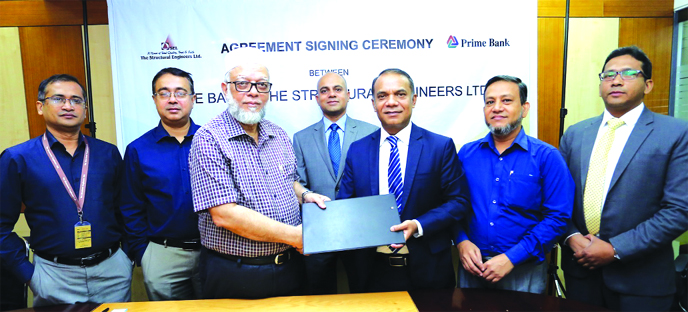 Zubayer Ershad, Head of Consumer Banking Business of Prime Bank and Engr Md Abdul Awal, Managing Director of Structural Engineers Ltd (SEL), exchanging an agreement signing document at the letters office in the city on Saturday. Under the deal, both the S