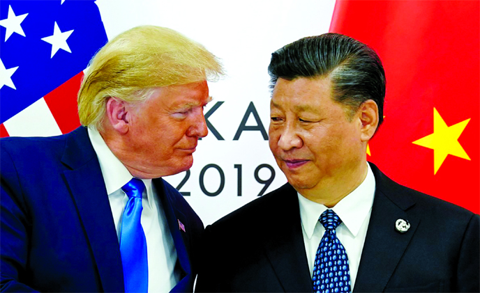 US President Donald Trump meets with China's President Xi Jinping at the start of their bilateral meeting at the G-20 leaders summit in Osaka in Japan on Saturday.