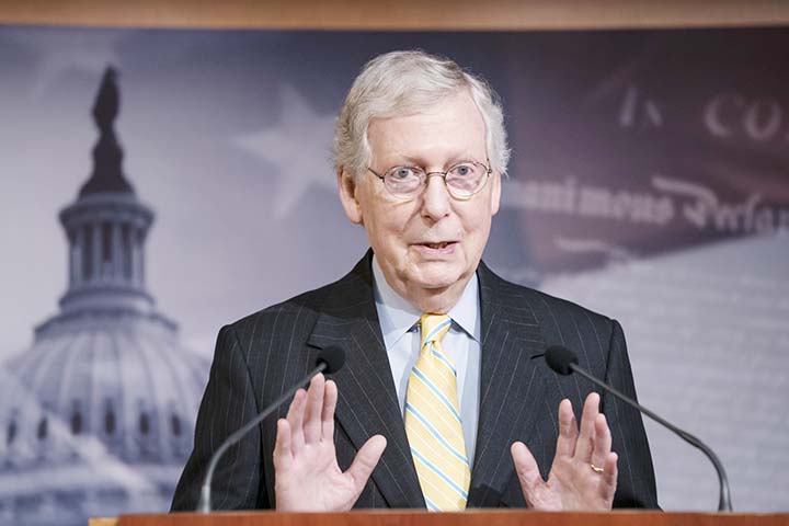 Senate Majority Leader Mitch McConnell, R-Ky., holds a news conference ahead of the Fourth of July break, at the Capitol in Washington on Thursday.