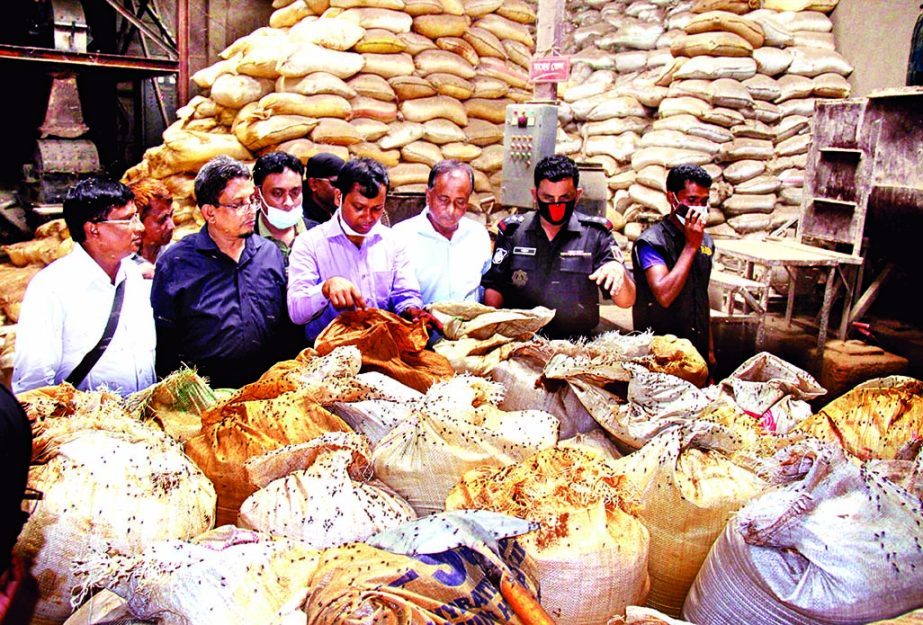 RAB mobile court on Saturday raided in city's Demra area, seized 6000 tons of contaminated poultry feed, produced by three factories. All three factories were sealed and the owners fined Taka 32 lakh. 16 people involved in the process were also sent to j