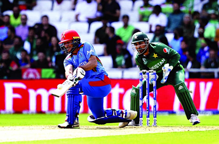 Afghanistan's Rahmat Shah bats during the ICC World Cup Cricket match between Pakistan and Afghanistan at Headingley in Leeds, England on Saturday.