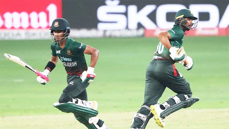 Bangladesh's Mahmudullah (right) and Afif Hossain take a run during the Asia Cup Twenty20 international cricket match between Bangladesh and Sri Lanka at the Dubai International Cricket Stadium in Dubai on Thursday. Agency photo
