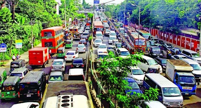 Dhaka city plunges into massive traffic chaos as thousands of vehicles got stuck for hours in Moghbazar area in the capital on Thursday, causing immense sufferings to commuters.