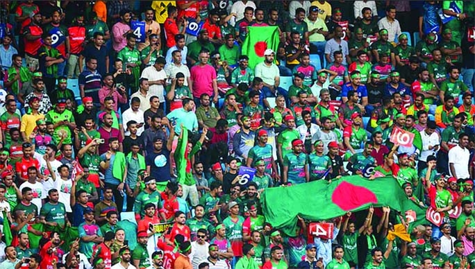 Bangladesh fans watching the Group-B match of the T20 Asia Cup between Bangladesh and Sri Lanka at Dubai International Cricket Stadium in the United Arab Emirates on Thursday.