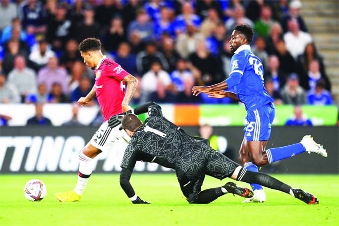 Manchester United's Jadon Sancho (left) on the verge of netting the all-important goal during their Premier League match away to Leicester City on Thursday.