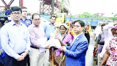 SYLHET: The Divisional Commissioner of Sylhet Dr. Muhammad Mosharraf Hossain inaugurates OMS programme for low income people in Sylhet on Thursday.