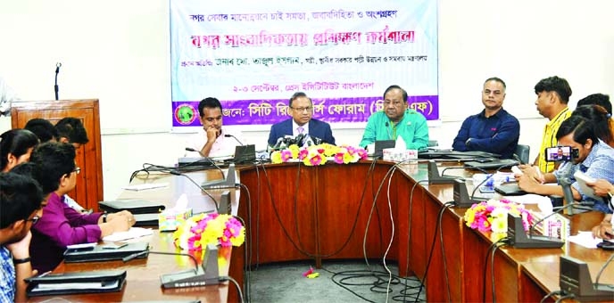 Local Government Minister Tajul Islam speaks at the inaugural ceremony of a training workshop on 'City Journalism' at Bangladesh Press Institute in the city on Friday.