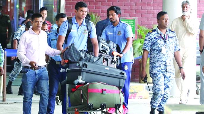 Bangladesh pacer Taskin Ahmed and opener Anamul Haque Bijoy walk out of the VIP Lounge at the Hazrat Shahjalal International Airport on Saturday.
