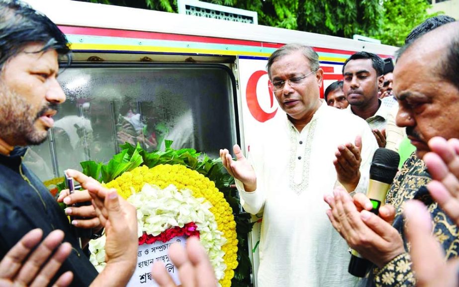 Information and Broadcasting Minister Dr. Hasan Mahmud along with others offers munajat after placing floral wreaths on the coffin of legendary lyricist Gazi Mazharul Anwar at the Central Shaheed Minar in the city on Monday. NN photo