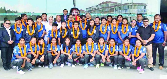 Members of Bangladesh Women's Football team with the officials of All Nepal Football Association at Kathmandu, the capital city of Nepal recently.