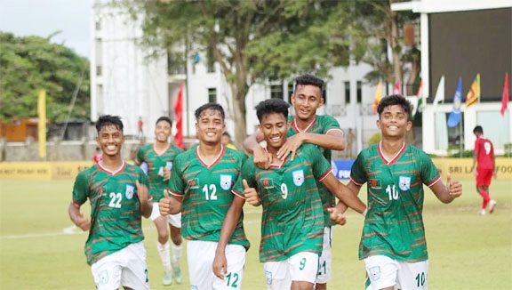 Players of Bangladesh U-17 football team celebrate after scoring a goal against Maldives U-17 football team in their group-A match of the SAFF U-17 Championship at Racecourse International Stadium in Colombo, the capital city of Sri Lanka on Wednesday.