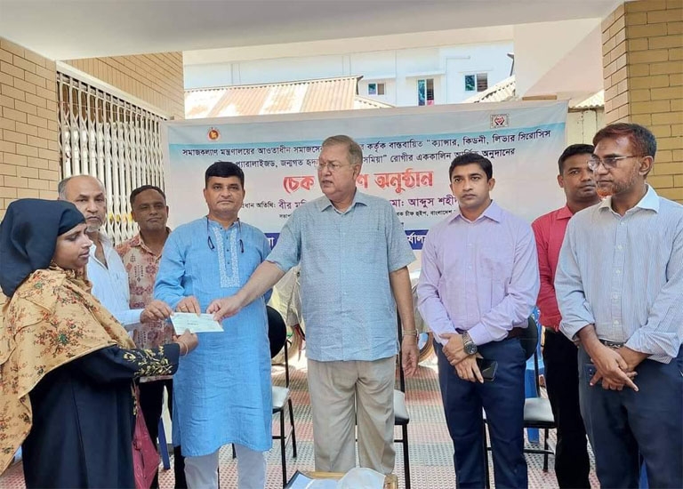 Vice-Principal Dr Md Abdus Shahid, Mp from Moulvibazar-4 constituency distributes cheque as donation money of tk. 50,000 each among the patients of various diseases in Sri Mangal on Thursday.