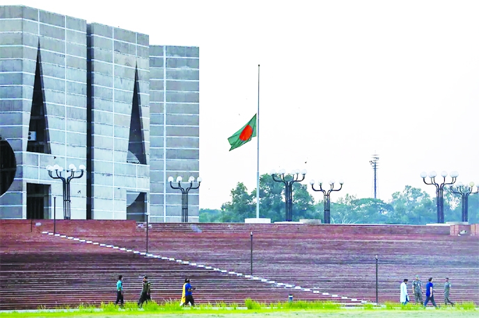 Bangladesh’s National Flag remains at half mast in front of Jatiyo Sangsad Bhaban in the capital on Friday in tribute to Queen Elizabeth II.