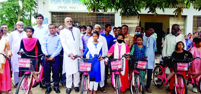 SHERPUR (BOGURA): Alhaj Habibor Rahman MP distributes bicycles among the female students of poor tribal community at Sherpur Upazila on Friday.