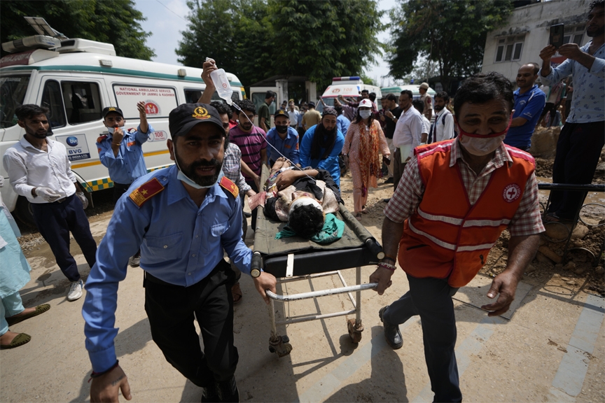 A passenger injured in a bus accident in Jammu and Kashmir's Poonch district is brought for treatment at a hospital in Jammu, India, Wednesday, Sept.14, 2022.