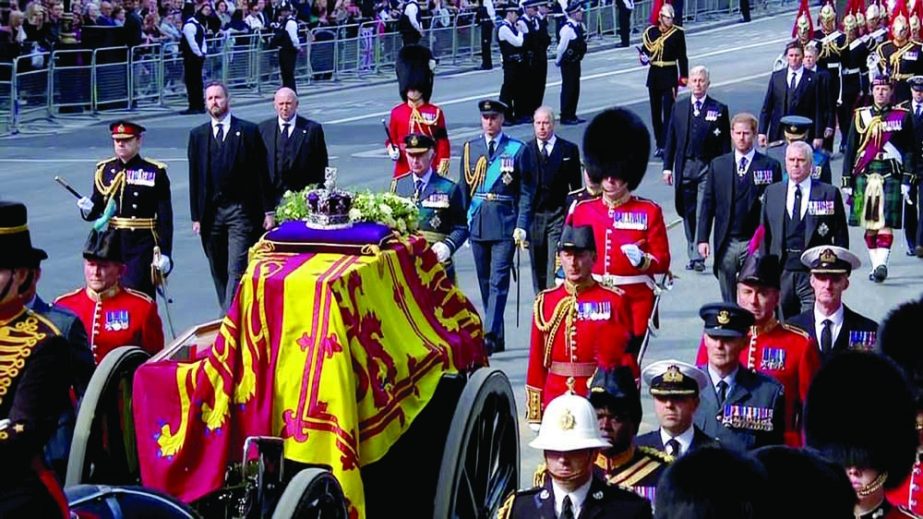 King Charles III, Prince Harry and Prince William walk behind the coffin during the procession for the Queen Elizabeth II at Buckingham Palace in London on Wednesday. Agency photo