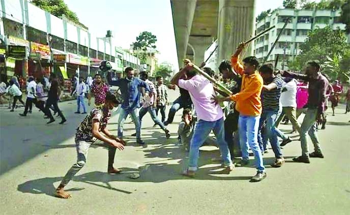 Leaders and activists of BNP and Awami League lock into a clash in the city's Mirpur Section-6 on Thursday. NN photo