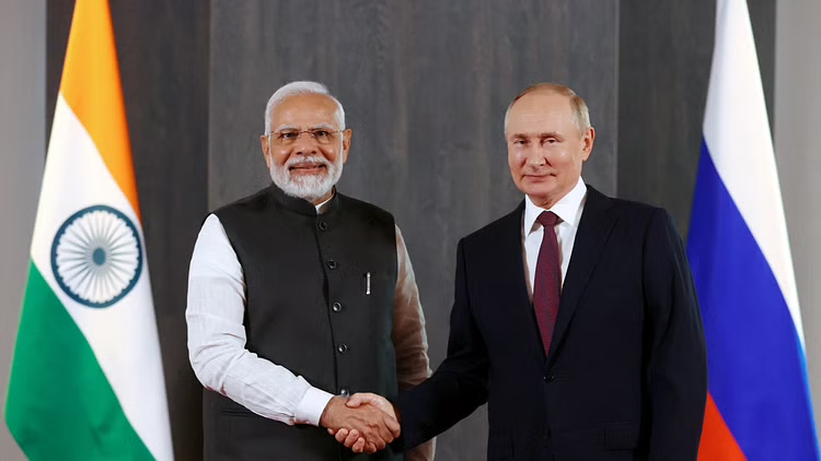 Russian President Vladimir Putin and Indian Prime Minister Narendra Modi attend a meeting on the sidelines of the Shanghai Cooperation Organization (SCO) summit in Samarkand, Uzbekistan Sept 16, 2022.