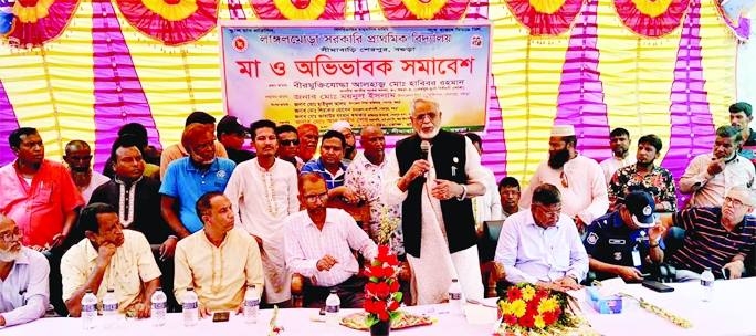 SHERPUR (BOGURA): Alhaj Habibor Rahman MP speaks at a Mother and Guardian Meeting in Laungalmor Government Primary School premises at Seemabari Union on Sunday.