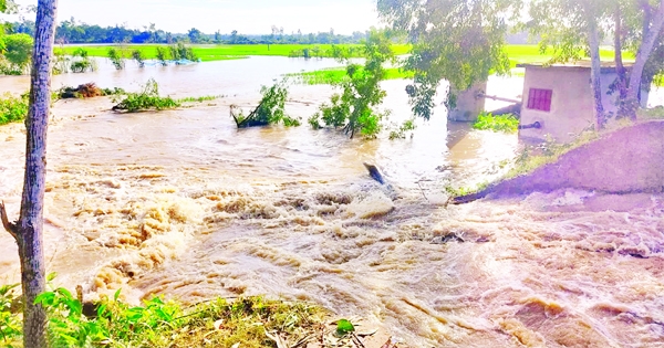 Low-lying areas of North Doulatpur union under Fulgazi upazila in Feni district are flooded on Monday, as the flood protection embankment collapsed becasuse Muhuri River swelled due to heavy rains and upstream water from India.