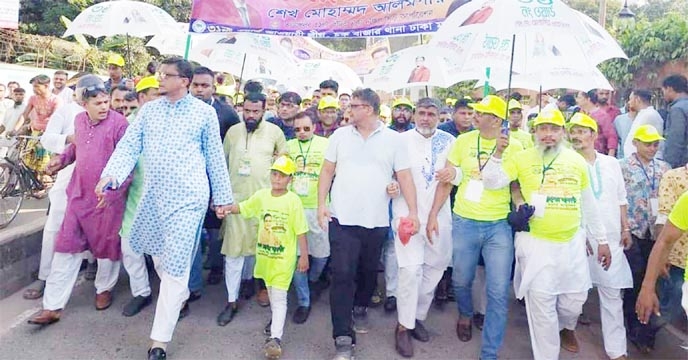 27, 28, 29, 30, 31 No Wards under Chwakbazar thana bring out a rally in the city's Nazimuddin Road on Friday to make success of its conference. Councillor of 31 No Ward Sheikh Md. Alamgir was present on the occasion, among others.