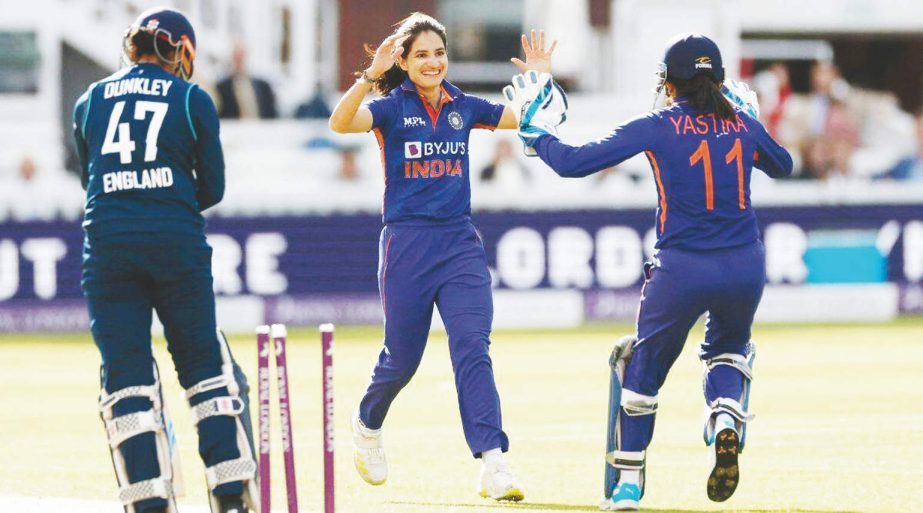 India's Renuka Singh (center) celebrates with Yastika Bhatia (right) after taking the wicket of England's Sophia Dunkley on Saturday. Agency photo