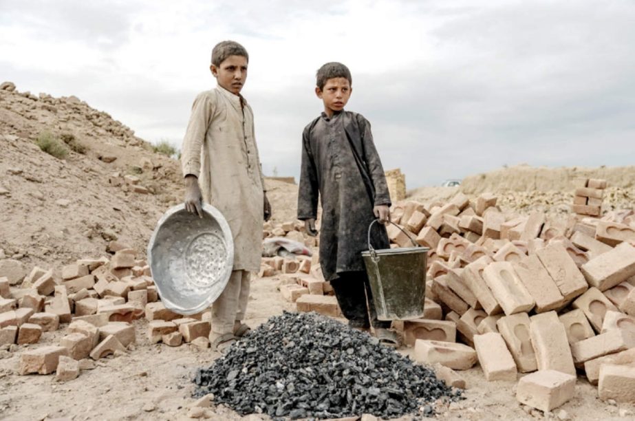 Children as young as four or five years old are working alongside with their families in the many brick factories on the highway north out of the capital. Agency photo