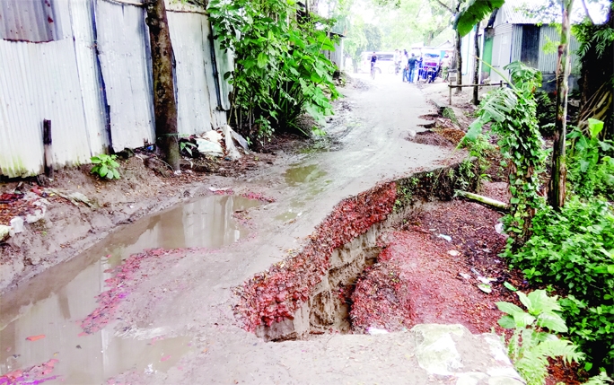 JAMALPUR : The communication between Charpolish Taltola More to 5 No LGED Road was hampered as the side of the road has collapsed recently. This snap was taken on Wednesday.