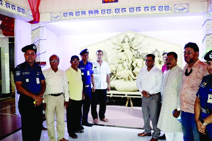 HALUAGHAT (Mymensingh): Masum Ahmed Bhuiyan, SP, Mymensingh visits puja mandaps in Haluaghat Upazila on Wednesday.