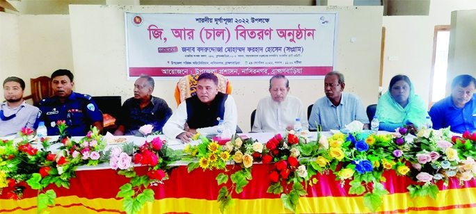 NASIRNAGAR (Brahmanbaria): Bodruddoza Md. Farhad Hossain speaks at the rice distribution programme marking the Durga Puja at Upazila Parishad Auditorium as the Chief Guest organised by Upazila Administration on Thursday.