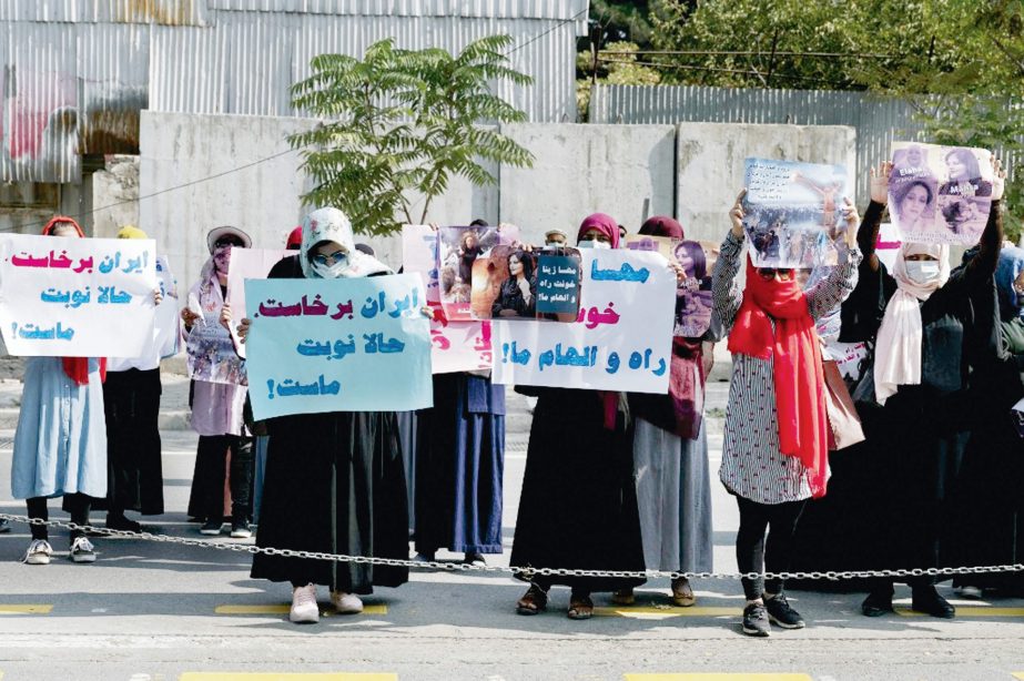 Afghan women hold placards as they take part in a protest in front of the Iranian embassy in Kabul on Thursday. Agency photo